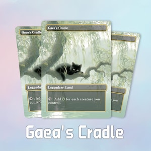 May include: Three "Gaea's Cradle" trading cards. Each card features a black cat resting on a tree branch with a willow tree background. The cards have text that reads "Legendary Land" and "Gaea's Cradle".