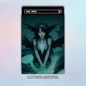 May include: A rectangular trading card titled SOL RING with the number 1 in the corner. The artwork features a dark-haired figure with wings and a crown in teal water, flanked by two dark sea creatures. The text MATTE/GLOSSY/FOIL appears at the bottom.