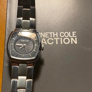 Ladies Kenneth Cole Reaction Silver Tone Black Dial Analog Watch /vintage silver wristwwatch quartz movement /model KC4655