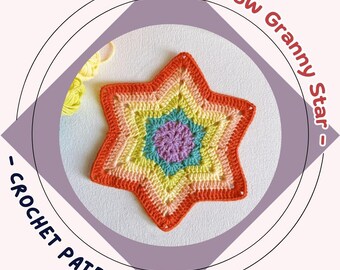 May include: A handmade, rainbow-colored crochet star. The star features a vibrant gradient of colors, including orange, yellow, green, blue, and purple. The text "Rainbow Granny Star" and "Crochet Pattern" are displayed around the star.