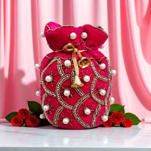 Pink Velvet Embellished Potli Bag – Pearl & Sequin Bridal Clutch | Handmade Wedding Drawstring Purse with Bell Tassels
