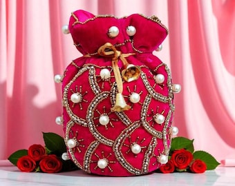 Pink Velvet Embellished Potli Bag – Pearl & Sequin Bridal Clutch | Handmade Wedding Drawstring Purse with Bell Tassels