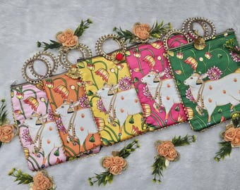 Assorted Lotus and Cow Pichwai Print Silk Potli Bags For Return Gift Favor Wedding/Housewarming, Party favor return gifts potli