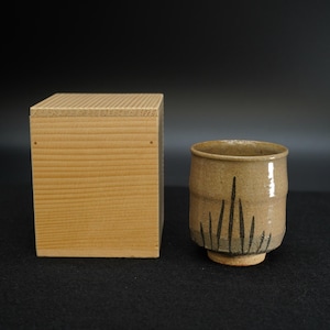 May include: A set of three ceramic mugs with a speckled, matte finish. The mugs are in shades of cream, light gray, and dark gray. Each mug has a simple, modern design and a rounded handle.