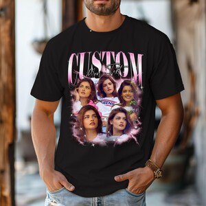 May include: Black t-shirt with a custom design featuring the word "CUSTOM" in pink script above a collage of six images of a person. The words "Your Text" are below the word "CUSTOM".