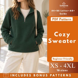 May include: A dark green quarter-zip sweater with long sleeves and front pockets, paired with white pants. The orange side panel features the text SoftPrint LAB, A4+US Letter+A0+ Guide, PDF Pattern, Cozy Sweater, Beginner Friendly, XS-4XL, 16 sizes.