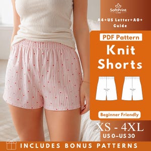 May include: A digital sewing pattern for knit shorts featuring a light pink fabric with thin vertical white stripes and small red hearts. The graphic includes the text SoftPrint LAB, A4+US Letter+A0+ Guide, PDF Pattern Knit Shorts, Beginner Friendly, XS-4XL, US 0-US 30.