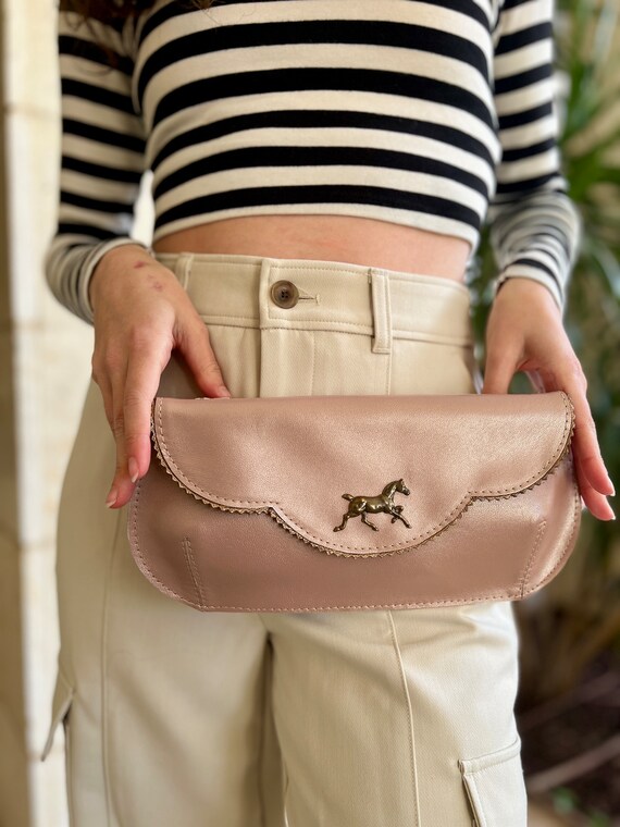blush leather clutch