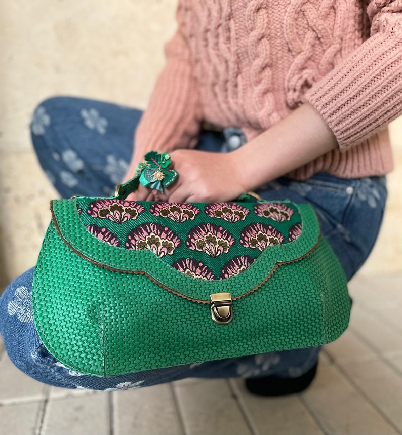 Green leather handbag with flowers