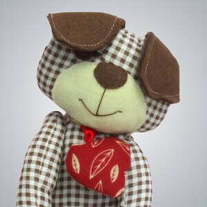 Harris soft toy puppy dog sewing pattern.  Easy to sew  Printed pattern makes softie or cute doorstop