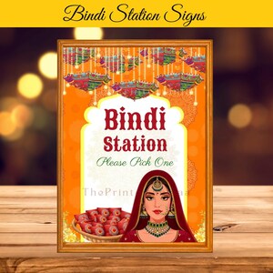 Könnte beinhalten: Ein gerahmtes Schild mit dem Text "Bindi Station Signs" oben. Das Schild zeigt die Worte "Bindi Station, Please Pick One" in einer dekorativen Schriftart. Eine Frau in traditioneller indischer Kleidung ist darunter abgebildet.