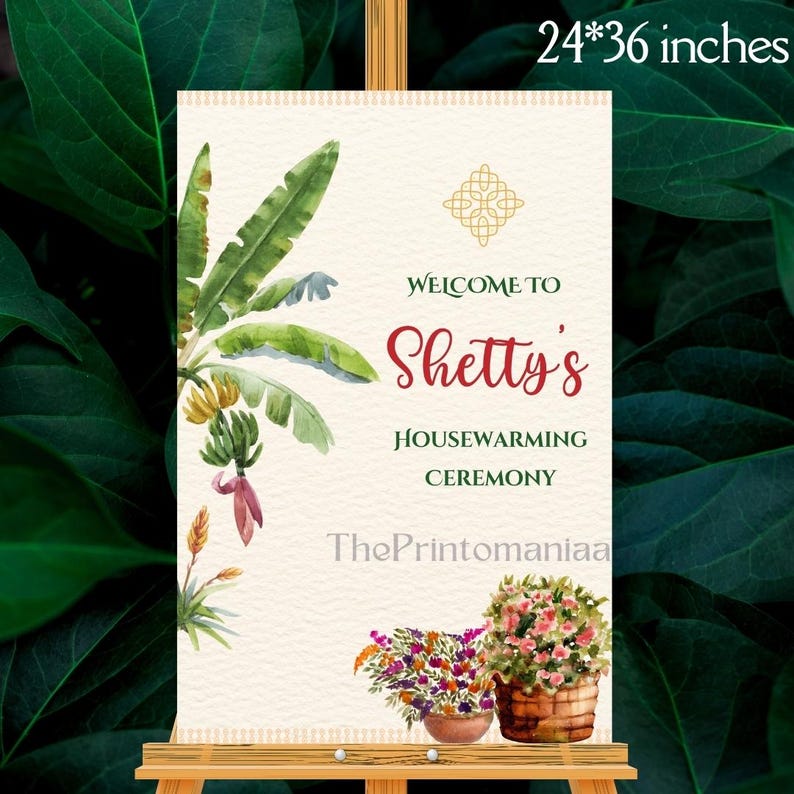 May include: A housewarming ceremony sign, 24x36 inches, features the text "Welcome to Shetty's Housewarming Ceremony." The sign has watercolor illustrations of banana leaves, flowers, and a gold geometric design. ThePrintomaniaa is printed at the bottom.