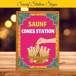 Puede incluir: Un letrero enmarcado con el texto "Saunf Cones Station" en amarillo y blanco sobre un fondo rosa. El letrero presenta una cesta de caramelos de colores y una mano sosteniendo una bolsa de caramelos. El marco es dorado con detalles azules y verdes.