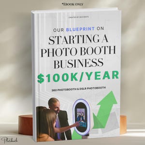 May include: A white ebook cover titled Our Blueprint on Starting a Photo Booth Business $100K/Year. The cover features text, a graphic of a green upward arrow, and a photograph of two people interacting with a 360 and DSLR photo booth unit.