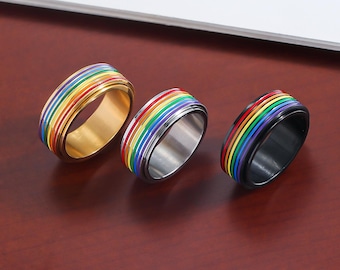 Anillo giratorio Pride Colors – Anillo antiestrés LGBTQ+ arcoíris, anillo de acero inoxidable para la ansiedad con bandas de 6 colores, banda de 8 mm y 10 mm de ancho.