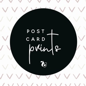 May include: Black circle with white text that says "POST CARD prints" and a small avocado illustration.