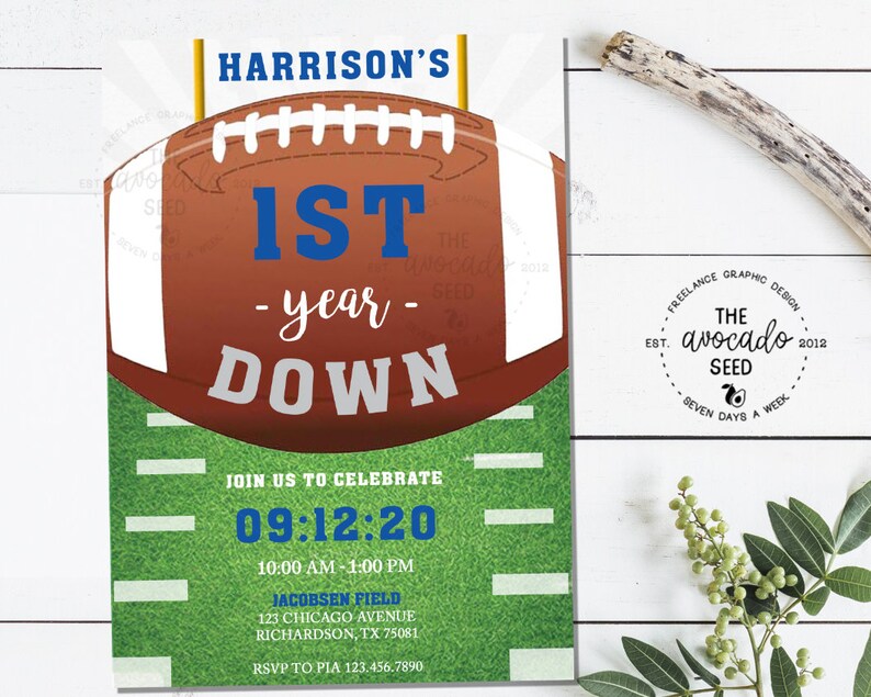 May include: A football-themed invitation for a 1st birthday party. The invitation features a brown football with white laces and a blue "1st" on a green field. The text reads "Harrison's 1st -year- Down" and "Join us to celebrate 09:12:20 10:00 AM - 1:00 PM Jacobsen Field 123 Chicago Avenue Richardson, TX 75081 RSVP to Pia 123.456.7890".