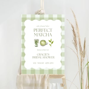 May include: A light green and white gingham bridal shower sign with the text "she found her PERFECT MATCHA". The sign includes watercolor illustrations of matcha drinks and leaves. The sign reads "WELCOME TO GRACIE'S BRIDAL SHOWER SAT MAY 1ST 12PM 2PM".
