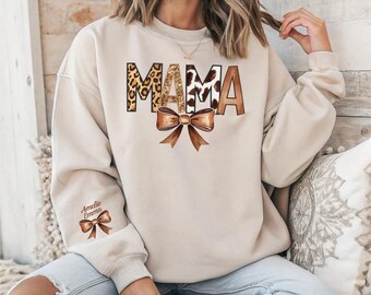 Custom Leopard Mama Sweatshirt With Kid Name On Sleeve, Personalized Cowhide Coquette Bow Mom Sweatshirt, Gift For Mom, Mothers Day FM31