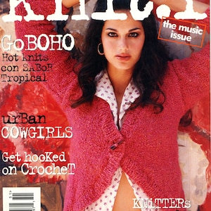 May include: Vogue Knitting magazine cover featuring a woman wearing a pink knit cardigan over a floral print shirt. The cover includes text: "Go Boho," "Urban Cowgirls," and "Knitters Who Rock."
