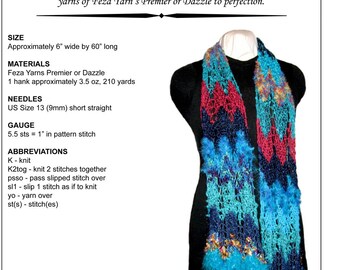 May include: A crochet scarf pattern featuring a chevron lace design. The scarf is made with a multi-coloured yarn in shades of blue, red, and green. The pattern is called "Lacy Premier or Dazzle Scarf" and includes instructions for knitting the scarf. The pattern is by Trish Designs.