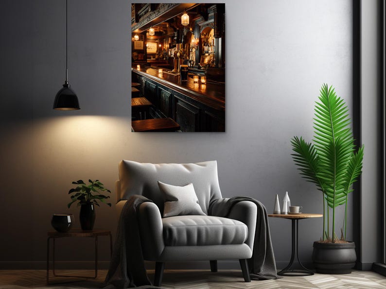 a cozy living room with a comfortable armchair, a small side table, and a potted plant. Above the armchair, there is a framed photograph of a bar scene, creating a warm and inviting atmosphere.