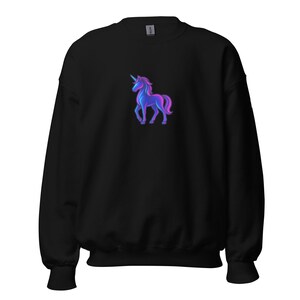 May include: Black sweatshirt with a neon unicorn design in blue, purple, and pink. The unicorn is in the centre of the sweatshirt. The sweatshirt has a crew neck and long sleeves.