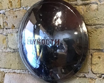 Plymouth dog dish hubcap polished chrome. Rounded design, vintage hub cap. Decorator piece or auto restoration, MCM Americana.