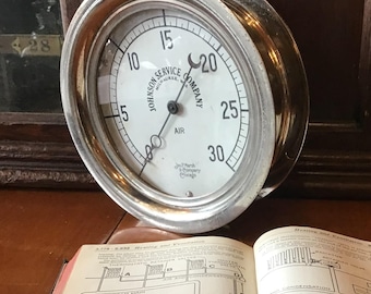 Large gauge by Johnson Service Co 0 to 30 air pressure gauge by the Jas.P. Marsh & Co. Chrome over brass, untested, with Audels guide book.