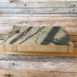 May include: A vintage book titled "Michigan Fox Squirrel Management" by D.A. Allen. The book cover features a black and white photo of a squirrel in a tree with a blurred background. The book is published by the Michigan Department of Conservation.