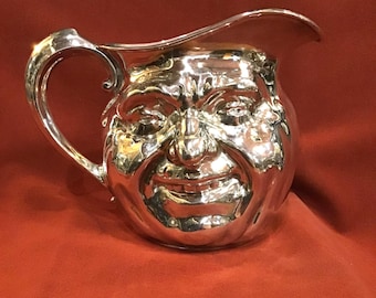 Sunny Jim pitcher by Reed & Barton