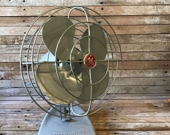 GE oscillating all metal fan with chrome cage, single speed desk fan with oscillating air flow, General Electric Co made in USA. Working fan