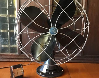 Vintage Emerson Oscillating Fan: type 79648- AU 17-inch, 3-Speed, 4 blade fan, cast metal base. Large heavy duty fan.