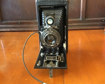 Kodak folding camera Classic early Art Deco style No. 2C Autographic Kodak JR. A-130 roll film camera. Bellows camera easily adapts to 120.