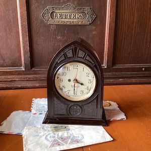 Vintage Bakelite Cathederal Style Clock, desk clock, time piece, converted to AA battery shelf clock, set and forget quartz Bakelite clock.