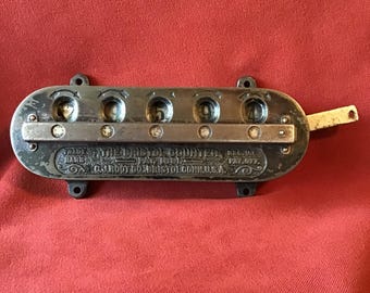 Bristol counter with blocked reset buttons. Heavy metal case, large lever, works smoothly. 5 digit, sturdy metal case and lever.