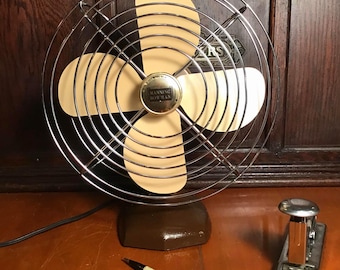Manning Bowman single speed fan made in USA. All metal fan in good working condition. Tilting head two tone quiet powerful.