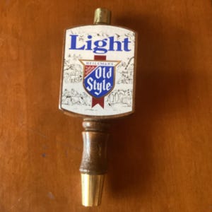 Heileman’s Old Style Light beer tap handle, vintage bar ware. Vintage keg tapper 6.75 inches tall 2.5 inches wide. Life of the party piece.