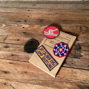 1942 War Department Infantry Field Manual: WWII Tactics & Combat Formations and badges.