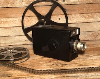 Vintage Kodak Brownie 8mm Movie Camera: 1960s Film Camera with oversized reel. Small manual camera, no batteries needed.