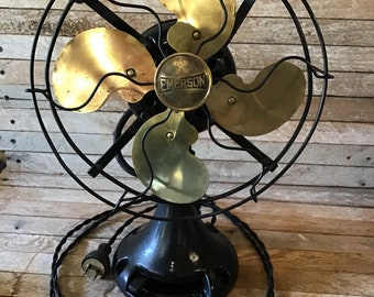 Emerson fan 13 inch cage, 4 brass blade fan 3 speed Classic 1920 styling. Open cage design. Rewired lubricated UL listed cloth covered wire