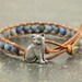 Rin reviewed Rustic Leather Cat Jewelry Silver Tan Denim Blue Cat Bracelet