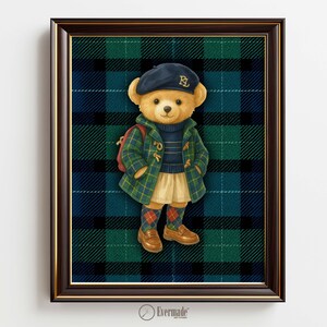 May include: Framed print featuring a teddy bear wearing a navy blue beret with "RL" on it, a green plaid coat, and a red backpack. The bear is set against a green and blue plaid background. The bear is wearing a blue sweater, a skirt, and argyle socks.