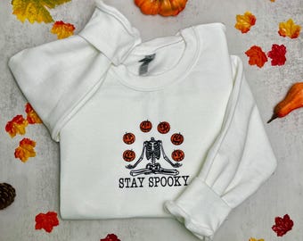 Stay Spooky Embroidered Sweatshirt: Halloween Skeleton Design