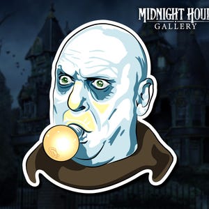 May include: A cartoon illustration of a man with a pale blue face and green eyes blowing a large, glowing, yellow bubble. He is wearing a brown robe and is set against a dark background with a house in the distance. The text "MIDNIGHT HOUR GALLERY" is at the top of the image.