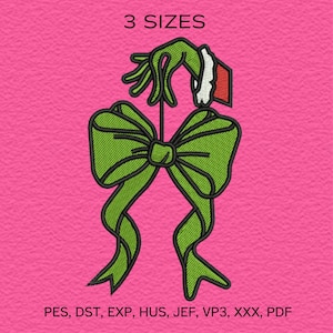 May include: An embroidered design featuring a green hand holding a gift tag above a green bow on a pink background. The text "3 SIZES" is at the top. The bottom text includes file formats: PES, DST, EXP, HUS, JEF, VP3, XXX, PDF.