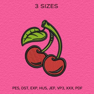 May include: Embroidered cherry design with green leaves and stems, set against a pink background. The text "3 SIZES" is at the top. The design is suitable for various embroidery projects.