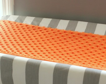 Contour Cover changing pad. Orange and gray minky.