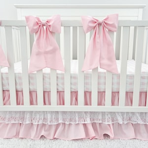Baby Girl Bow Crib Bedding. Pink and White Lace ruffled Crib skirt and bow collection.