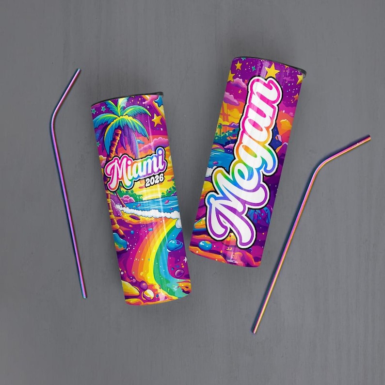 May include: Two stainless steel tumblers with colorful Miami-themed designs and matching straws. One tumbler features the word "Miami 2026" with a rainbow and palm tree. The other has the name "Megan" in a vibrant font.